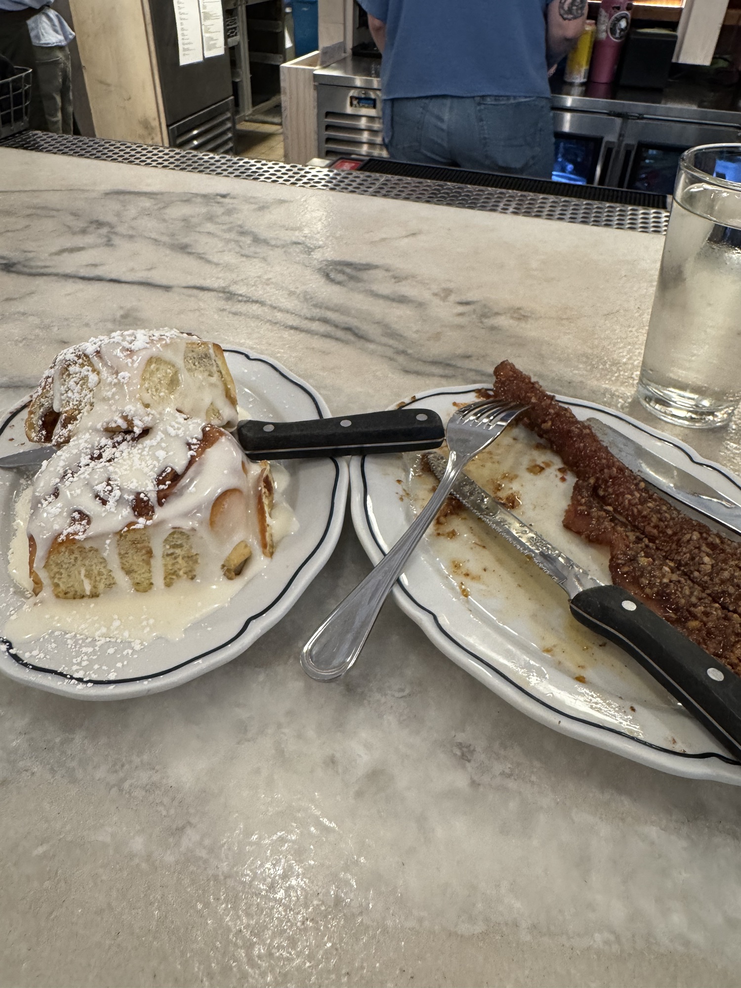 A cinnamon roll and praline bacon at Screen Door