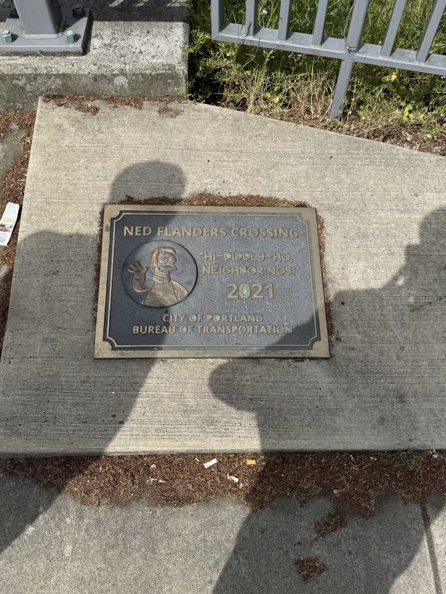 The Ned Flanders Crossing plaque in Portland